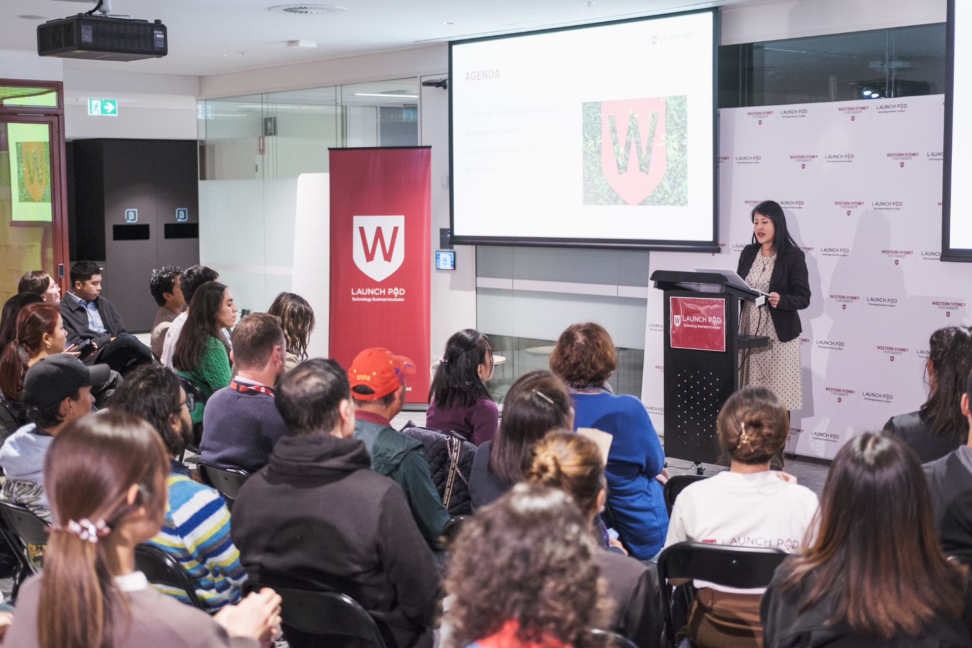 Lucy Lin presenting at a Western Sydney University program event